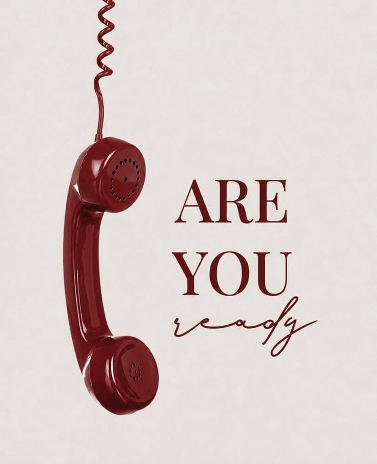 Red vintage telephone receiver hanging next to the words 'ARE YOU ready' on cream background.