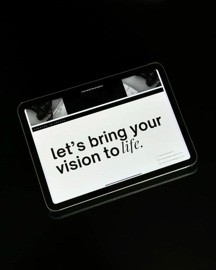 Tablet on a dark background displaying the slogan 'let's bring your vision to life.'